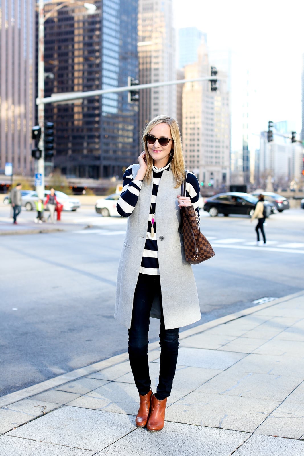 Long Gray Vest Over Striped Top and Slim Pants Long Gray Vest Over Striped Top and Slim Pants — Trendy Vest Outfits
