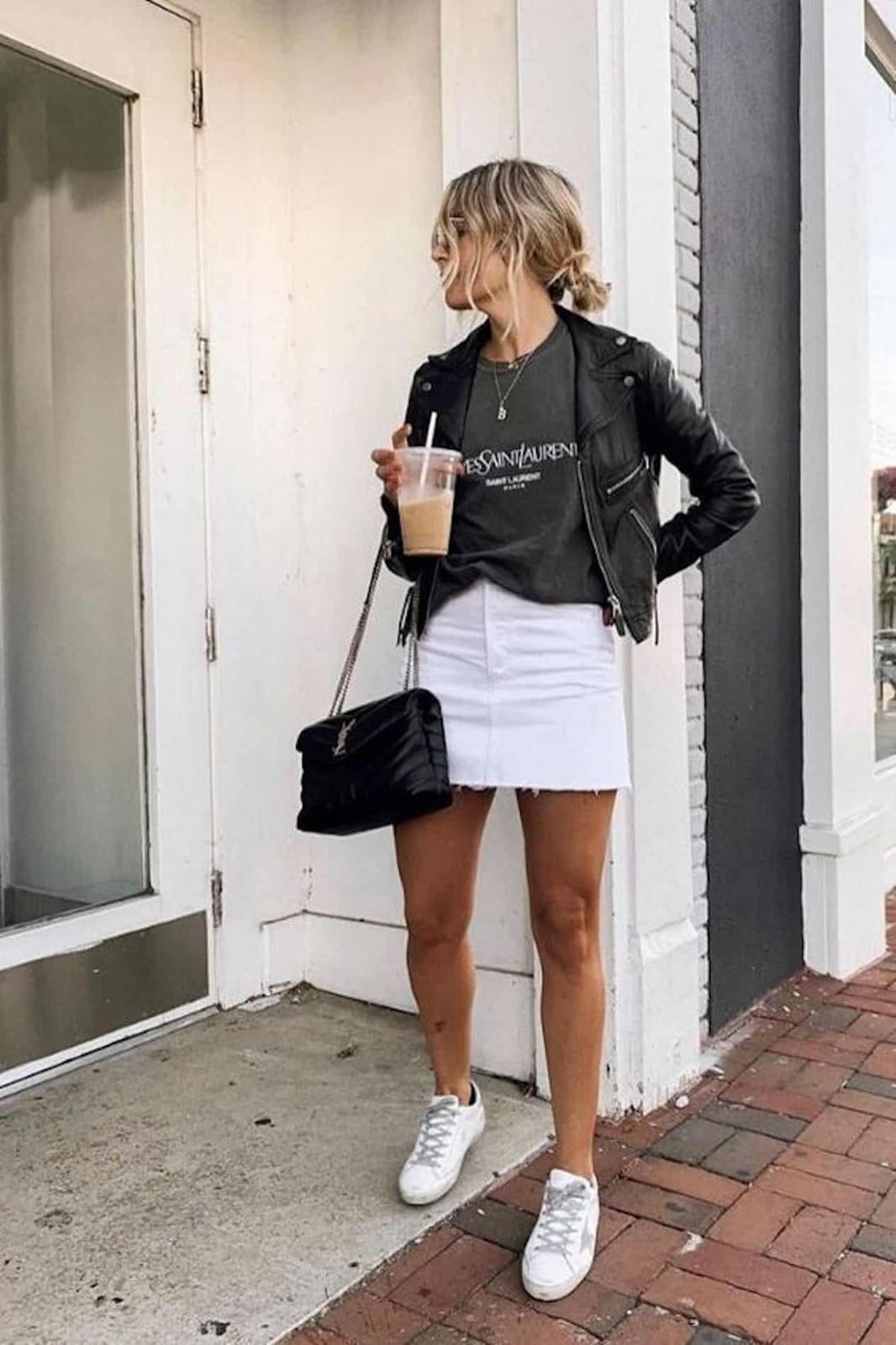 White Denim Mini Skirt With Graphic Tee And Leather Jacket — Trendy White Skirt Outfit