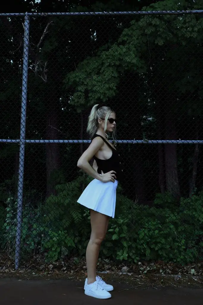 White Pleated Mini Skirt With Black Tank Top — Trendy White Skirt Outfit