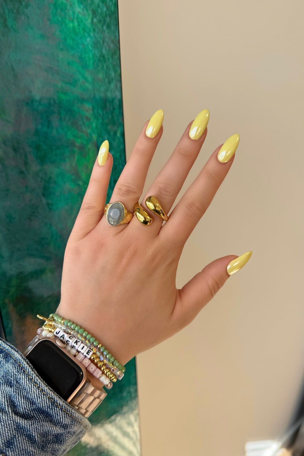 Solid Pale Yellow Glossy Medium Almond Nails, Close-Up Take Solid Pale Yellow Glossy Medium Almond Nails, Close-Up Take — Trendy Yellow Nails