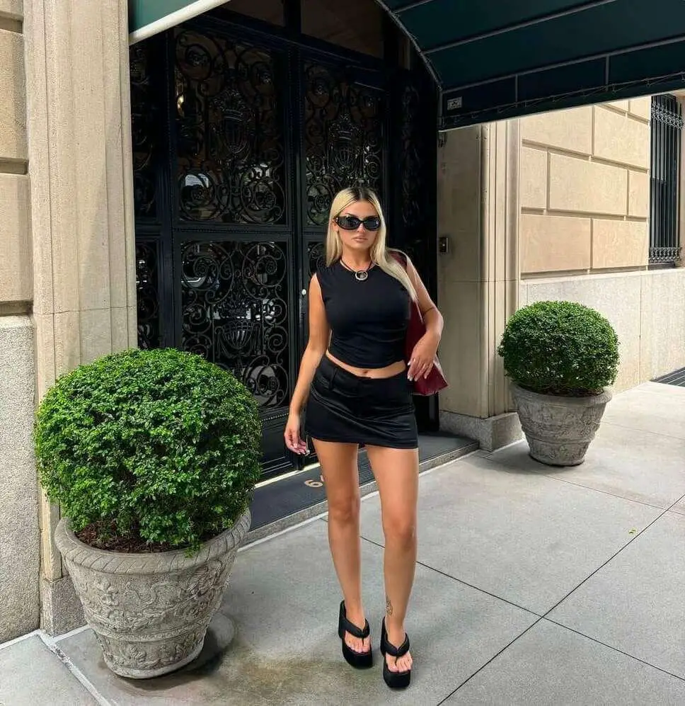 Black Crop Top With Low-Rise Mini Skirt Black Crop Top With Low-Rise Mini Skirt — Y2K Party Outfit Inspiration